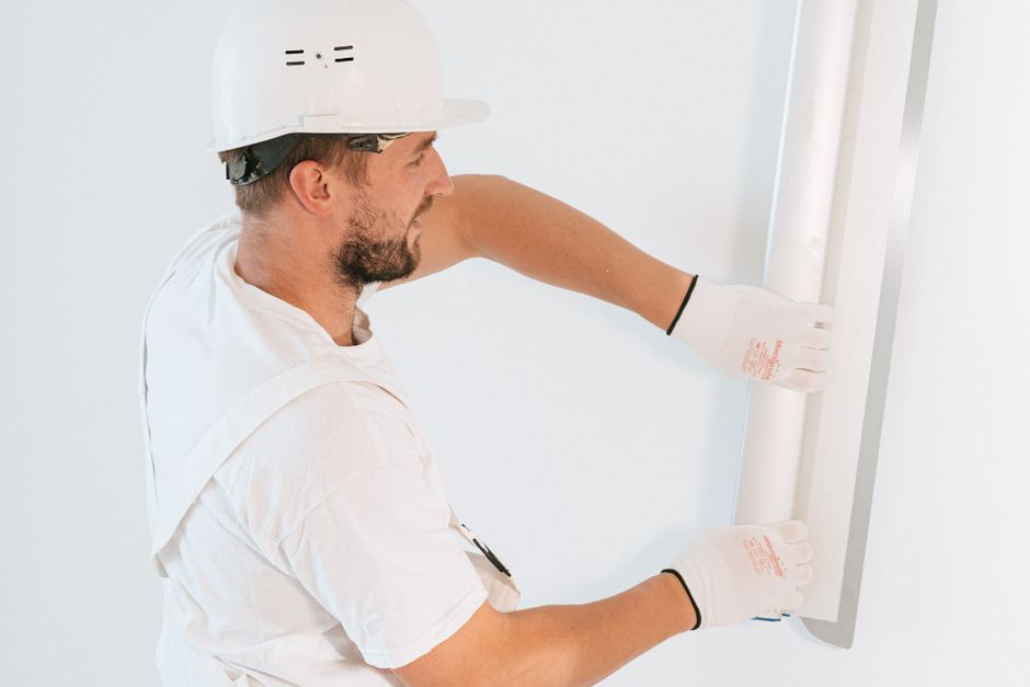Drywall being installed